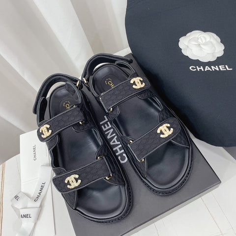 CHANEL 26S SANDALS IN BLACK FABRIC WITH PEARL-EMBELLISHED LOGO
