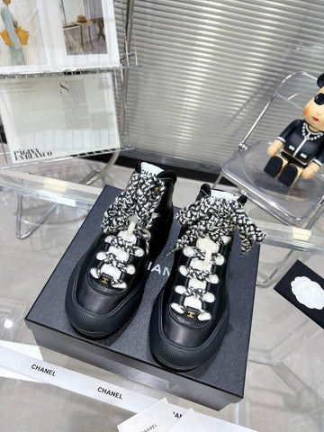 CC CANO ALTO SNEAKER IN BLACK CALFSKIN AND RUBBER