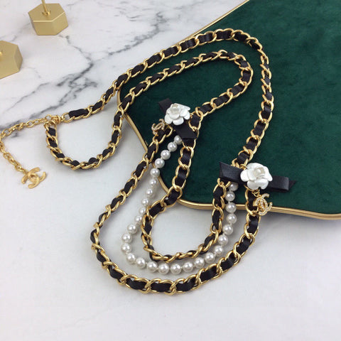 CHANEL 25S CHAIN BELT IN WHITE PEARL AND BLACK CALFSKIN 614403