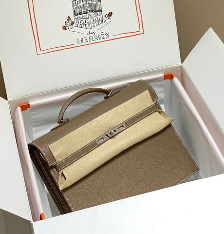 KELLY DEPECHES 34 BRIEFCASE IN ETOUPE TOGO CALFSKIN SILVER HARDWARE