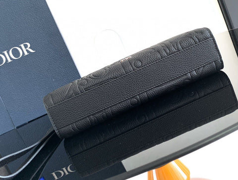 CLUTCH 27 BAG IN BLACK CALFSKIN EMBOSSED LOGO