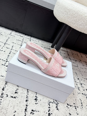 DIOR 26S HIGH HEEL SLIDES IN LIGHT PINK EMBOSSED OBLIQUE LACE EMBROIDERY