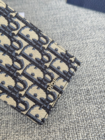VERTICAL LONG WALLET 19 IN BLUE MONOGRAM OBLIQUE JACQUARD