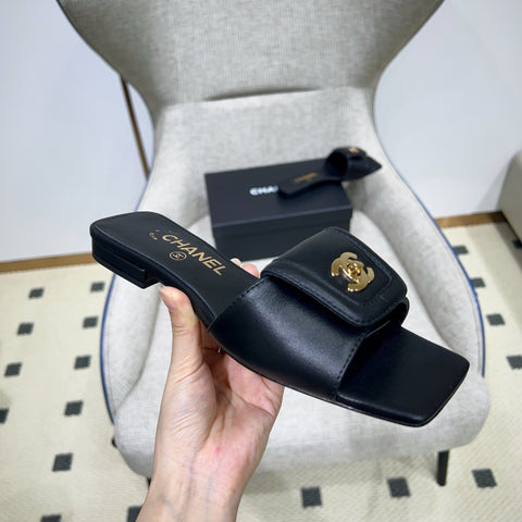 CHANEL 26S FLAT SLIDES IN BLACK LAMBSKIN