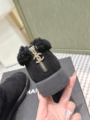 CHANEL 25S SHORT SUEDE BOOTS IN BLACK WITH SHEEPSKIN LINING