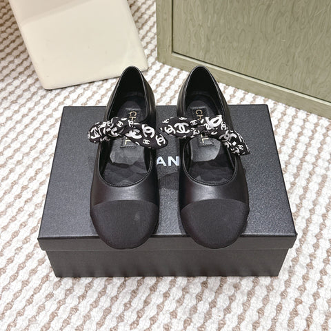 CHANEL 25S MARY JANES IN BLACK SHEARLING AND GROS GRAIN