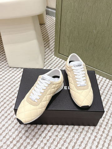 CHANEL 25S SNEAKERS IN LIGHT YELLOW CALFSKIN AND SUEDE