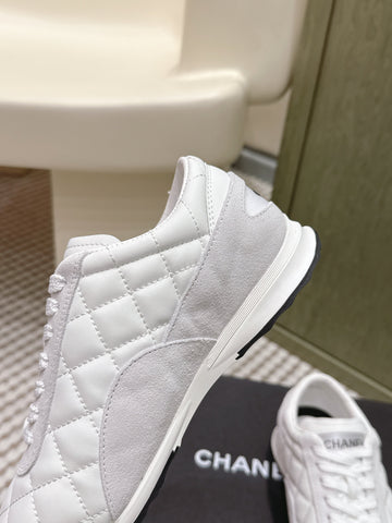 CHANEL 25S SNEAKERS IN WHITE CALFSKIN AND SUEDE