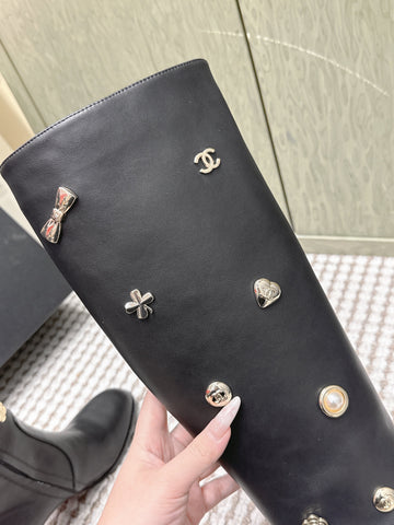CHANEL 25S KNEE-HIGH BOOTS IN BLACK CALFSKIN WITH RHINESTONES