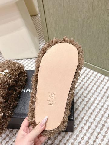 CHANEL 25S CLASSIC FURRY SLIDES IN BROWN WITH DOUBLE C LOGO