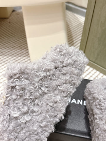 CHANEL 25S CLASSIC FURRY SLIDES IN GRAY WITH DOUBLE C LOGO