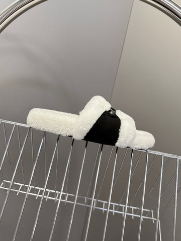 BALENCIAGA 25S SLIPPERS IN BLACK SUEDE AND WHITE WOOL