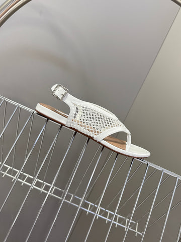 ALAIA 26S FLAT MESH THONG SANDALS IN WHITE PATENT CALFSKIN