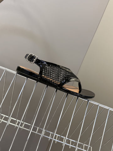 ALAIA 26S FLAT MESH THONG SANDALS IN BLACK PATENT CALFSKIN