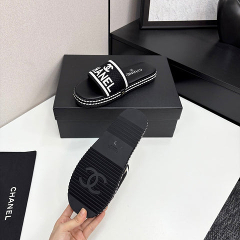 CC SLIDE SANDALS 25S IN BLACK FABRIC AND CALFSKIN