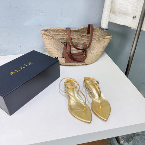 ALAIA 26S THONG SANDALS IN GOLD CALFSKIN
