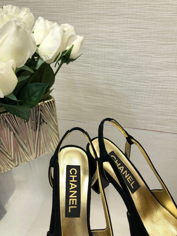 HIGH SLINGBACKS IN BLACK SUEDE AND GOLDEN LAMBSKIN