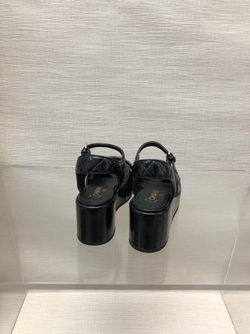 WEDGE SANDALS IN BLACK CALFSKIN