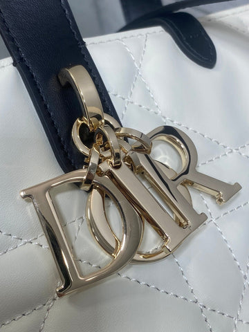 DIOR 25S TOUJOURS VERTICAL NANO TOTE BAG 18 IN IVORY BLACK MACROCANNAGE CALFSKIN