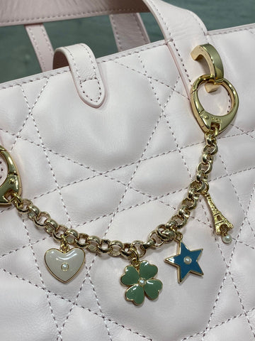 DIOR 25S TOUJOURS VERTICAL TOTE BAG 18 IN LIGHT PINK CALFSKIN WITH CHARM BRACELET STRAP