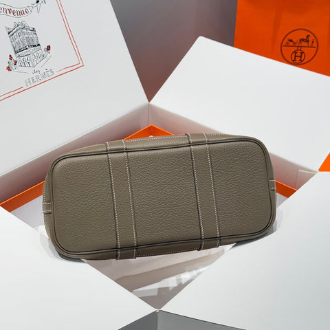 GARDEN PARTY 30CM IN BROWN TOILETS COTTON CANVAS AND TOGO ETOUPE CALFSKIN