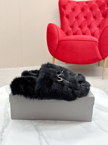 BALENCIAGA 25S SOFT FUR SLIPPERS IN BLACK FUR WITH RHINESTONE BOW