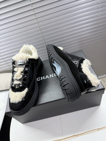 CHANEL 25S SNEAKERS WITH FUR ACCENTS 35MM IN BLACK CALFSKIN