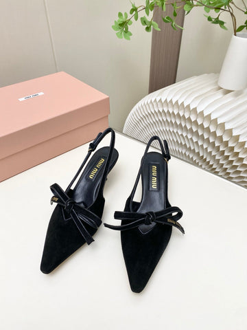 MIUMIU 26S SLINGBACK PUMPS 55MM IN BLACK SUEDE WITH BOW