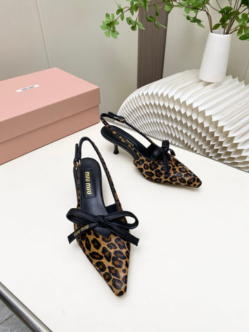 MIUMIU 26S SLINGBACK PUMPS 55MM IN LEOPARD PRINT CALF HAIR WITH BOW