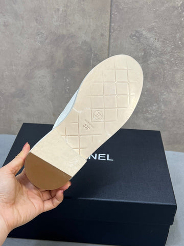 CHANEL 26S MULE LOAFERS IN WHITE CANVAS WITH QUILTED FLAP & CC LOGO