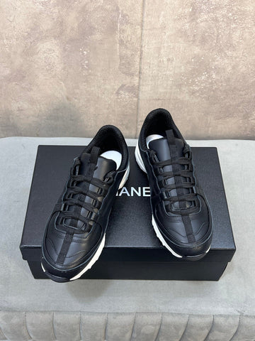 CHANEL 26S RUNNER CC LOGO SNEAKERS IN BLACK CALFSKIN
