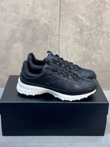 CHANEL 26S RUNNER CC LOGO SNEAKERS IN BLACK CALFSKIN
