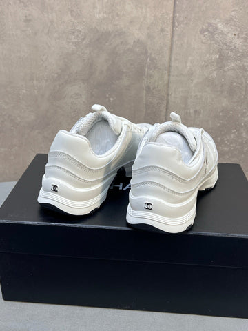 CHANEL 26S RUNNER CC LOGO SNEAKERS IN WHITE CALFSKIN