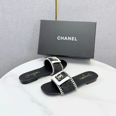 CHANEL 26S WOVEN STRAP SLIDES IN BLACK LAMBSKIN