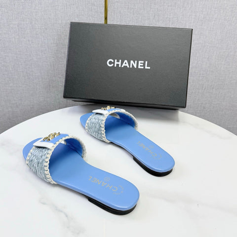 CHANEL 26S WOVEN STRAP SLIDES IN SKY BLUE LAMBSKIN