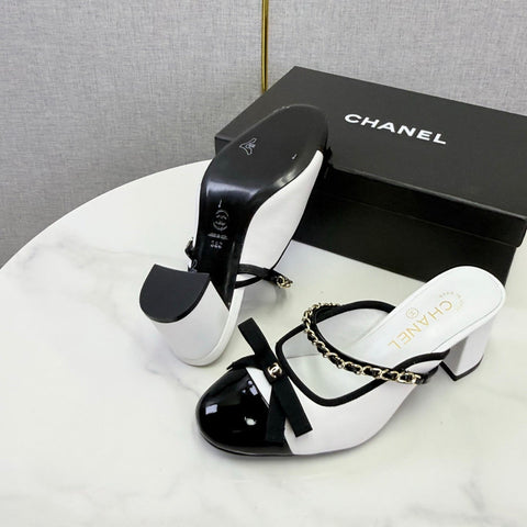 CHANEL 26S HIGH HEEL MULES 45 MM IN WHITE AND BLACK LAMBSKIN