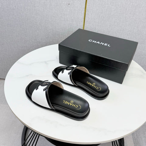 CHANEL 26S ICONIC CC SLIDES IN WHITE LAMBSKIN