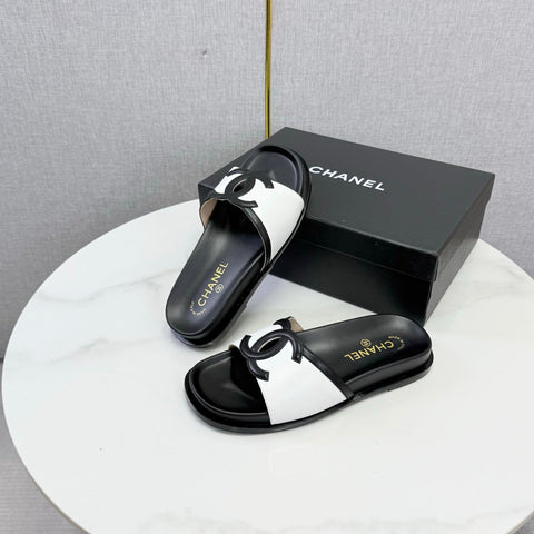CHANEL 26S ICONIC CC SLIDES IN WHITE LAMBSKIN