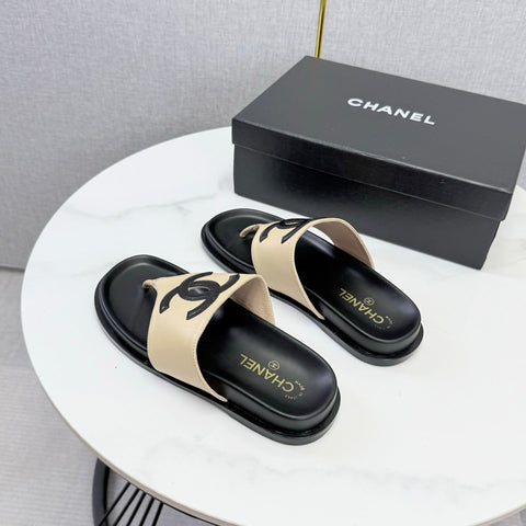 CHANEL 26S CC THONG SLIDES IN BEIGE AND BLACK LAMBSKIN