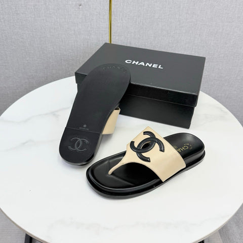 CHANEL 26S CC THONG SLIDES IN BEIGE AND BLACK LAMBSKIN