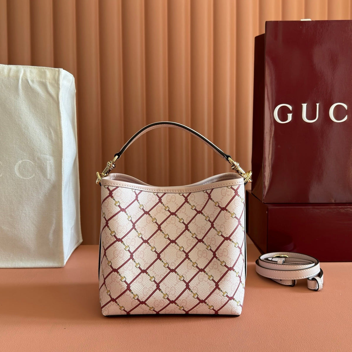GUCCI 26S GG EMBLEM BUCKET BAG 19 IN LIGHT PINK COATED FABRIC