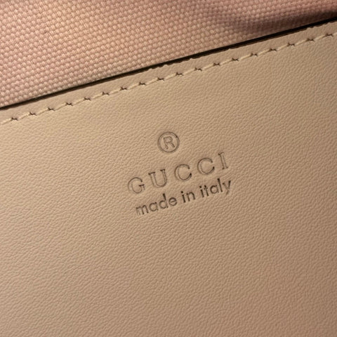 GUCCI 26S GG EMBLEM BUCKET BAG 22 IN LIGHT PINK COATED FABRIC
