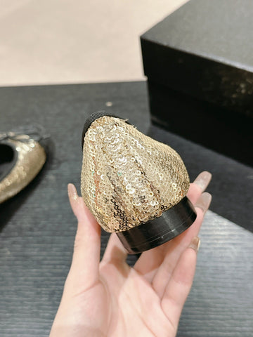 BALLET FLATS IN GOLDEN GLITTERED TULLE AND BLACK SATIN
