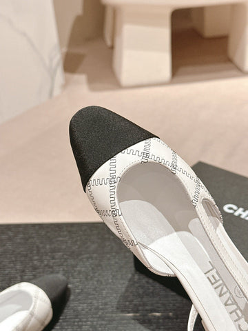 SLINGBACKS IN WHITE LAMBSKIN AND BLACK SATIN