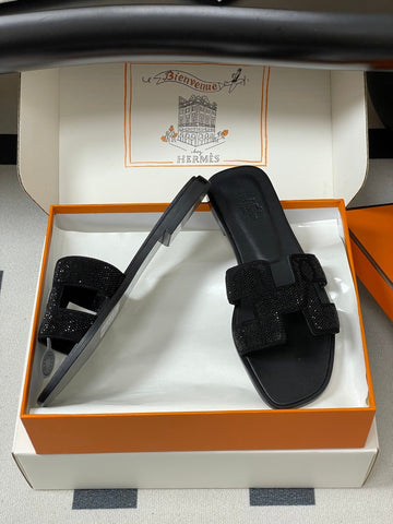 HM 25S ORAN SANDAL IN BLACK LAMBSKIN WITH STONE DETAILS