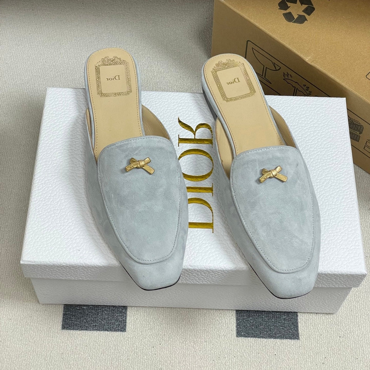 DIOR 26S MULES IN LIGHT BLUE GRAY SUEDE WITH BOW
