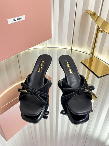 MIUMIU 26S MULE SANDALS 55MM IN BLACK SUEDE WITH BOW