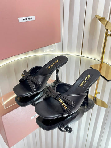 MIUMIU 26S MULE SANDALS 55MM IN BLACK CALFSKIN WITH BOW