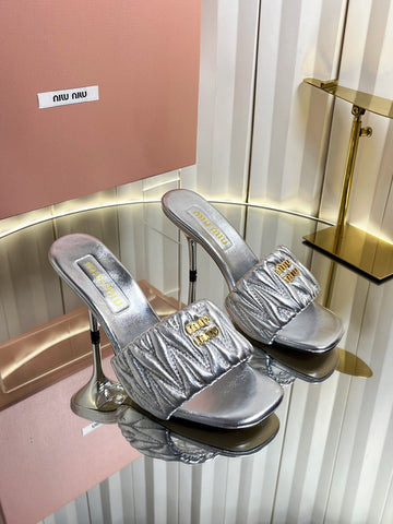 MIUMIU 26S HIGH-HEEL MULE SANDALS 85MM IN SILVER CALFSKIN GOLD HARDWARE