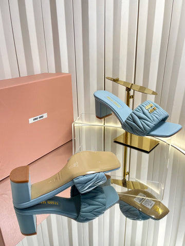 MIUMIU 26S PADDED MATELASSE MULE HEELS 65MM IN LIGHT BLUE CALFSKIN GOLD HARDWARE